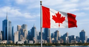 Canadian city skyline and national flag for jobs in Canada for foreigners 2026